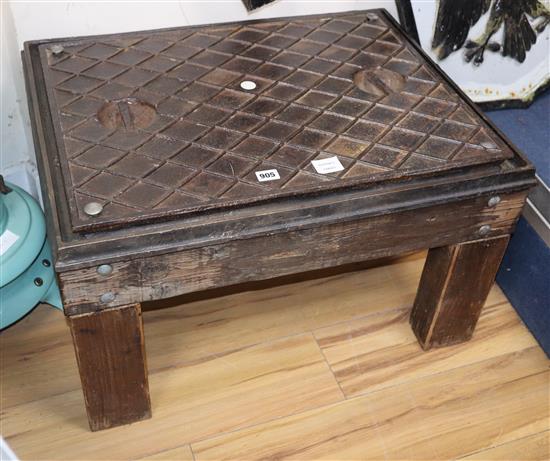 A manhole cover occasional table W.70cm